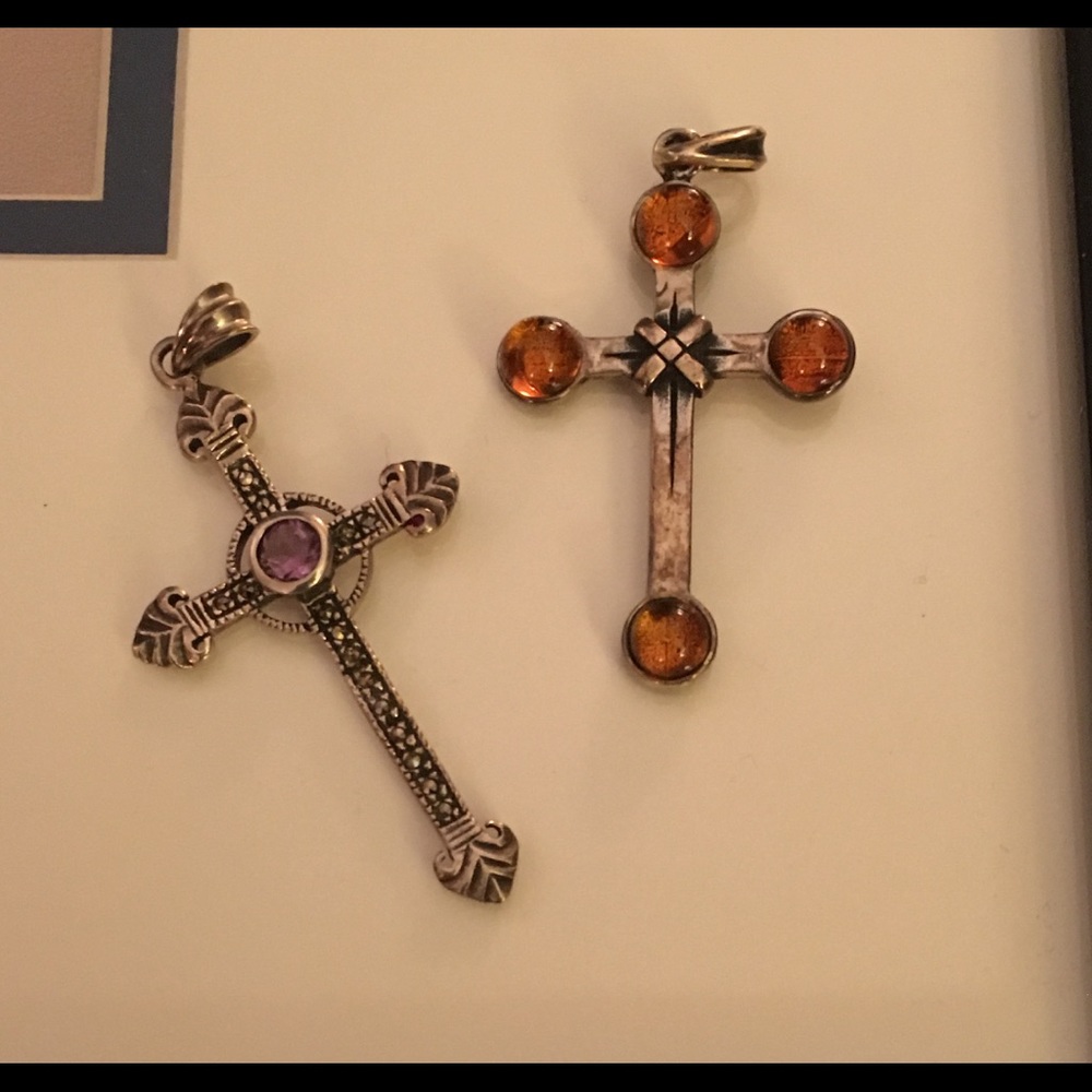 Two silver cross pendants